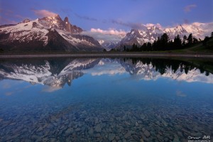 The Mont Blanc massive reflected in a lake near Chamonix, France